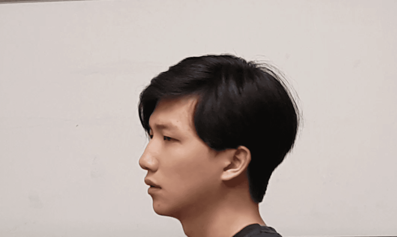 Side profile portrait of Sirid Rodsuteewat